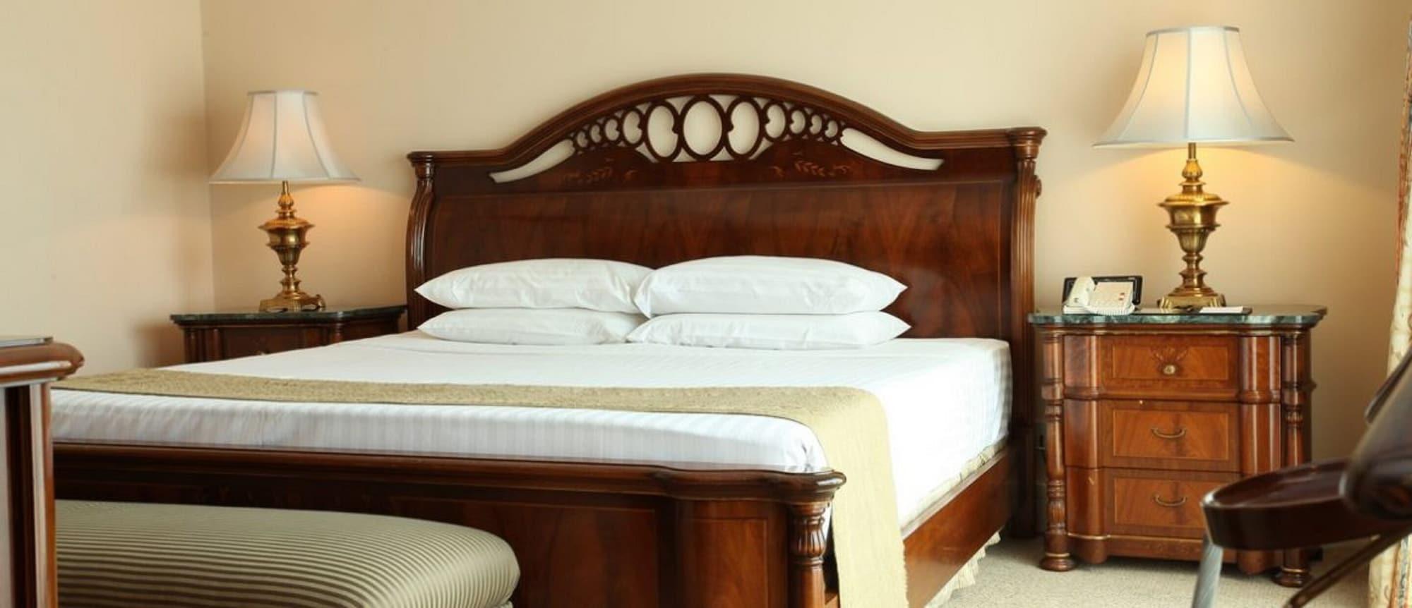Palace Of The Golden Horses Seri Kembangan Exterior photo A bed with a headboard