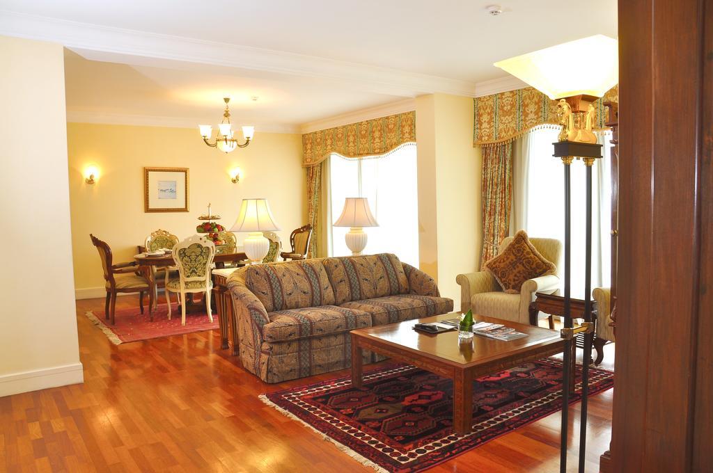 Palace Of The Golden Horses Seri Kembangan Exterior photo A living room in a typical apartment